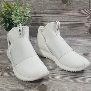 White Adidas Tubular Slip Ons